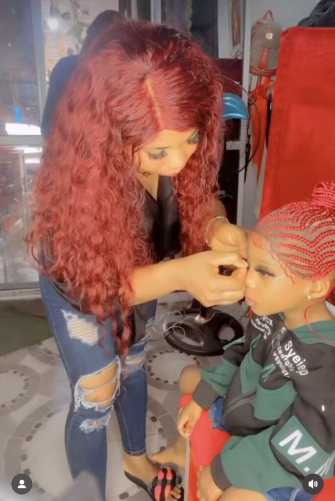 Nigerian lady shared adorable video of her Little Daughter fixing eyelashes, longnails and getting Glammed up!